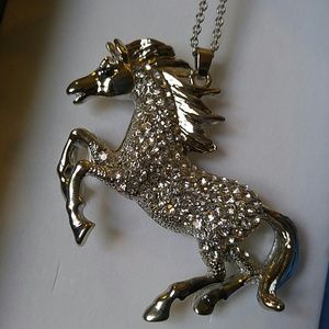 Horse necklace with crystals.